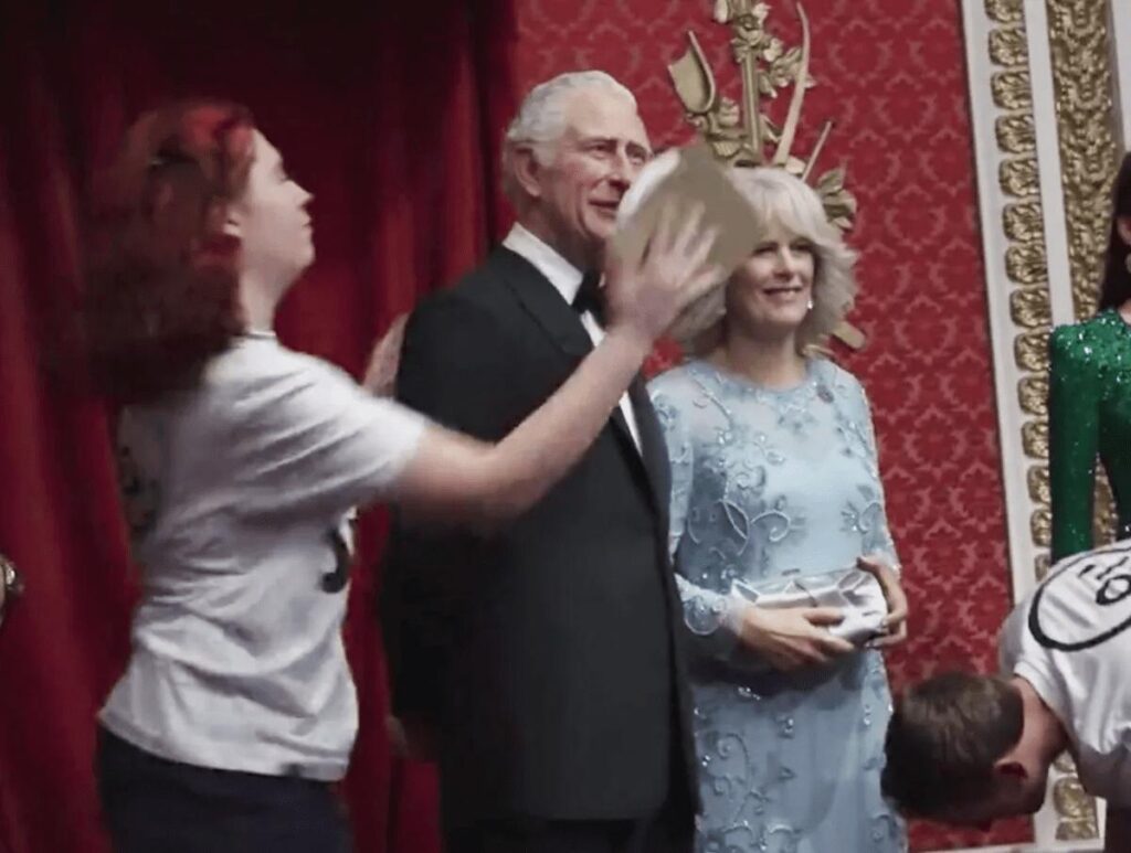 Activists Smear Cake On King Charles Wax Statue