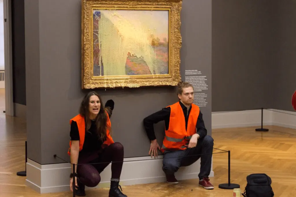 German Activists Throw Mashed Potatoes On A Monet's Art Piece