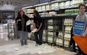 Teen Activists Are Pouring Milk On Supermarket Floors & Products In A New Wave Of Anti Dairy Protests