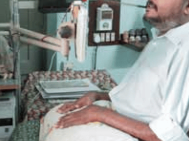 M P Anil Kumar at his desk at the Paraplegic Rehabilitation Centre in Pune. Photo Source Seema Pant