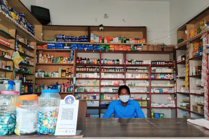 A Person Sitting in a Medicine Shop