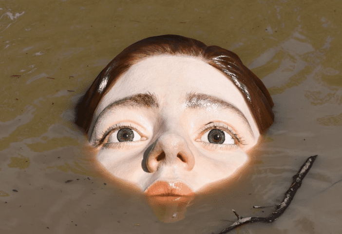 A Drowning Sculpture Questioning Our Future- Are We Going Drown Or Float?