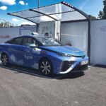 Hydrogen-powered Toyota Mirai owned by hype, the world's first fleet of hydrogen taxis.( Photo Credit: NBKF, CC BY-SA 4.0 DEED )
