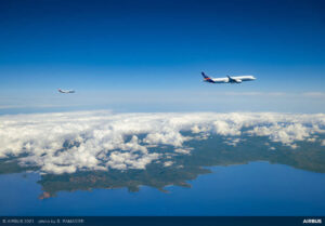 A350 flight test aircraft followed by DLR chase plane during ECLIF3 flight campaign "Photo Credits-Airbus"
