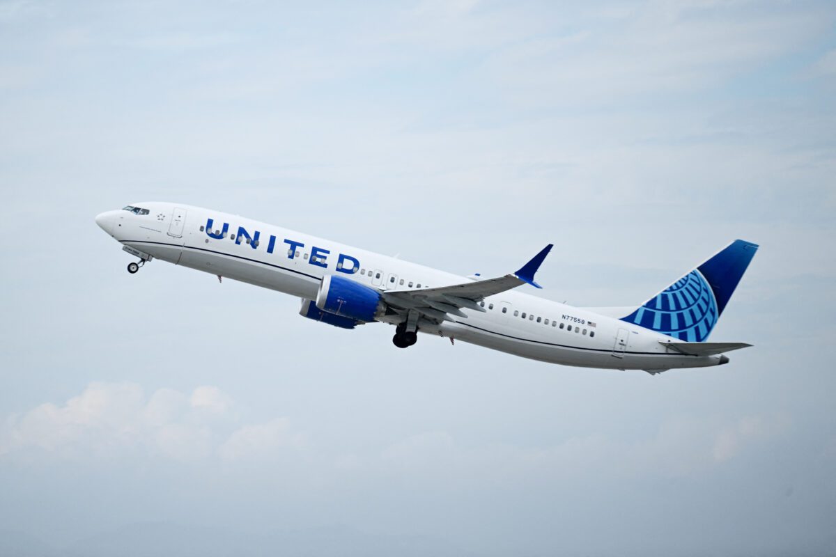 United Airlines aircraft taxiing at an airport, daytime view