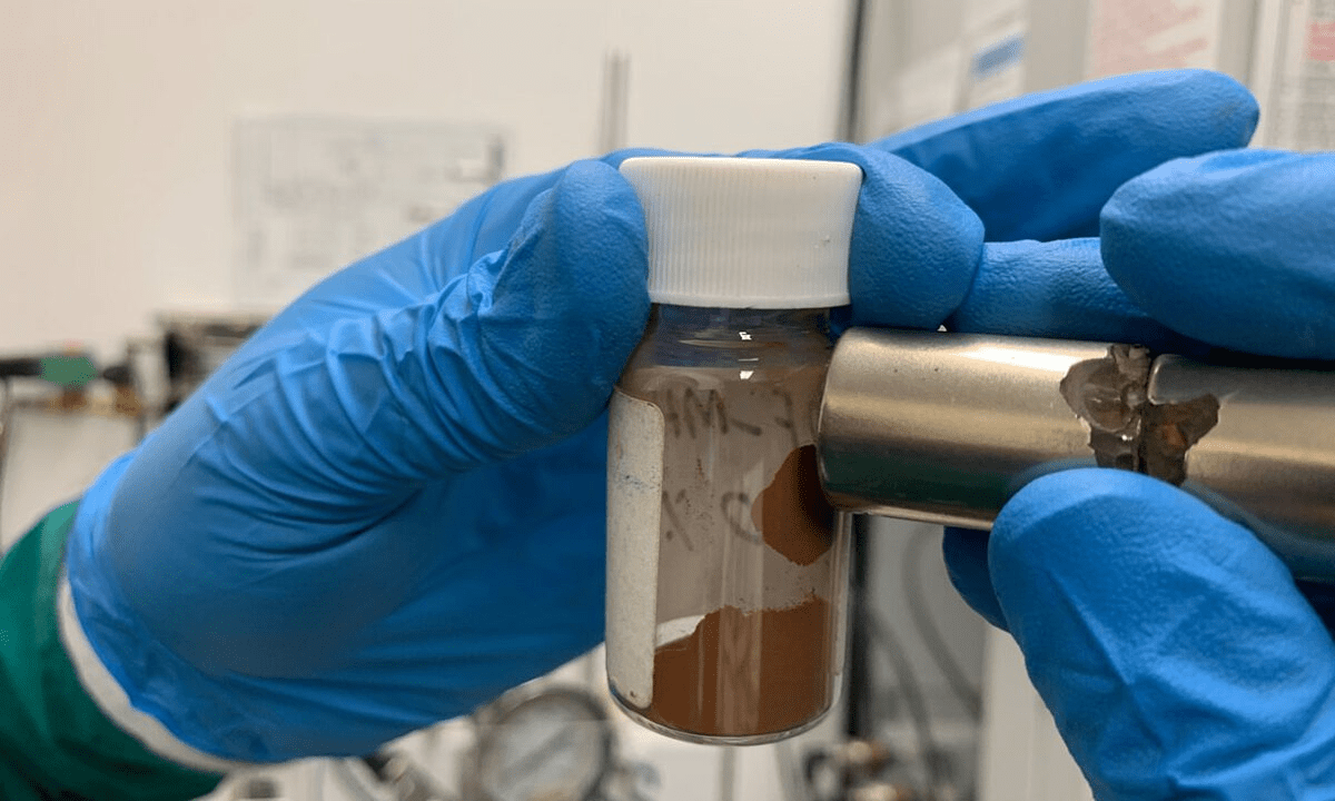 A magnet attracts the material that the team used to make adsorbents that remove microplastics and dissolved pollutants from water, at RMIT University