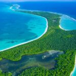 Aerial view of a tropical island and reef used for Chagos Islands deal coverage