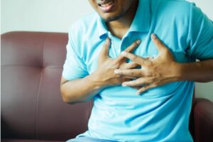Close-up of a Man in Blue Polo Shirt with Hands on Chest, Photo Source: Towfiqu barbhuiya (Pexels)