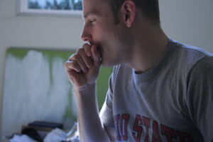 Representative Image: A person cough Photo Source: Rebecca Brown ( CC BY-NC 2.0)
