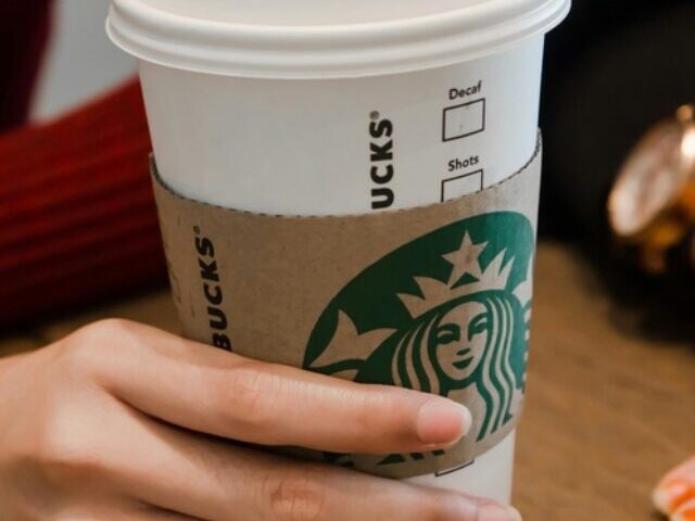 Person Holding White Starbucks Cup.Photo SourceAde Rifaie(Pexels)