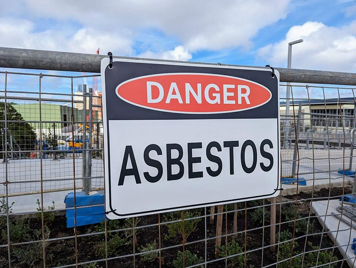 Representative Image. a warning sign secured to a metal fence in an outdoor setting. Photo Source - Jpatokal (CC BY-SA 4.0)