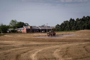 A serene rural setting showcasing agricultural activity. Photo Source - Unearthed