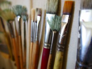 Representative Image A row of paintbrushes, Photo Source: Picryl