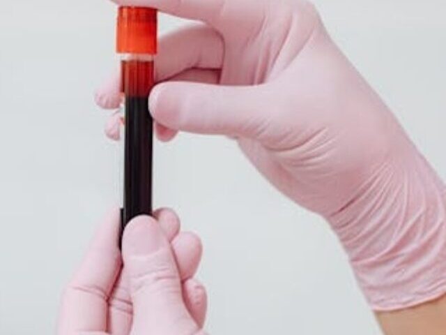 Representative Image Holding a Glass Test Tube, Photo Source: Kaboompics.com