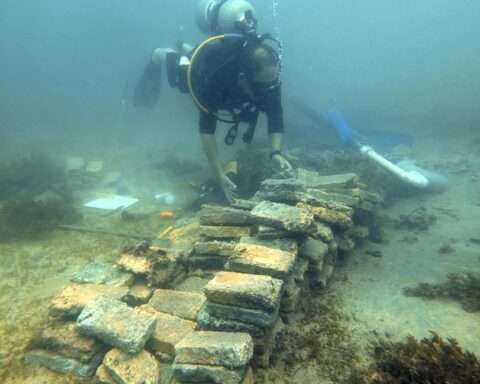 Marine archaeologist and research professor David Gregory from the National Museum of Denmark at piled bricks on the seabed in Costa Rica. Photo Source: Jakob Olling, The National Museum of Denmark