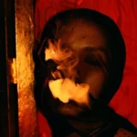 Woman wearing see- through Fabric on Face and smoking Photo Source-PEXELS- Ruslan Rozanov