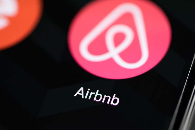 Airbnb app icon on smartphone screen