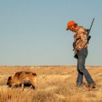 Representative Image Hunter with hunting dog, Photo Source: Strange Biology (CC BY 2.0)