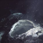 A “snowblower” hydrothermal vent spews hot water and white bits of bacterial mat that are blooming in the chemical-rich hot-spring water, showing that the lava flow that was erupted in 2011 at Axial Seamount is still cooling. Photo Source- Bill Chadwick, Oregon State University (CC BY-SA 2.0)