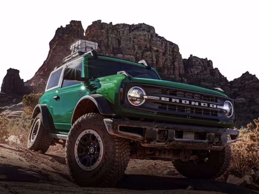 Ford Bronco SUV parked in the wild, front-side view