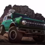 Ford Bronco SUV parked in the wild, front-side view