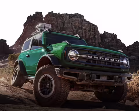 Ford Bronco SUV parked in the wild, front-side view