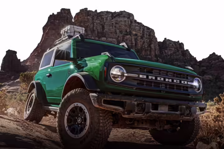 Ford Bronco SUV parked in the wild, front-side view