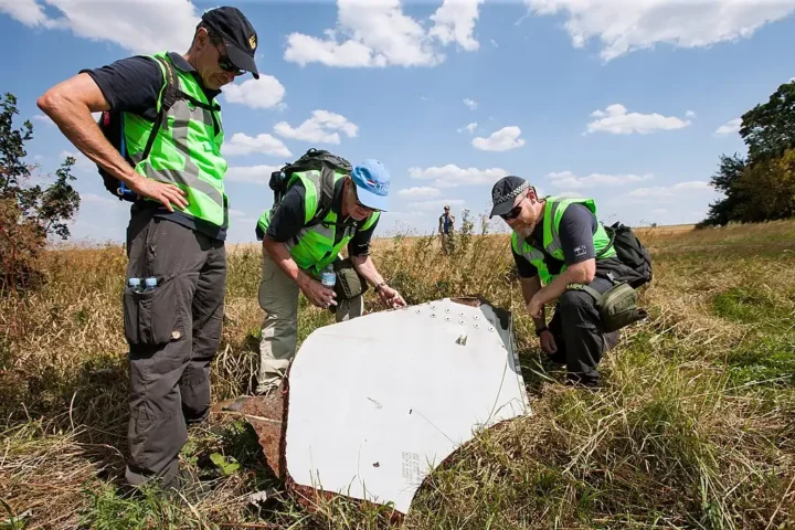 Investigation of the crash site of MH-17.