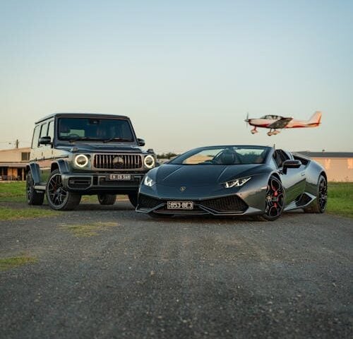 Luxury Black Cars on an Asphalt - PEXELS- Martynas Linge