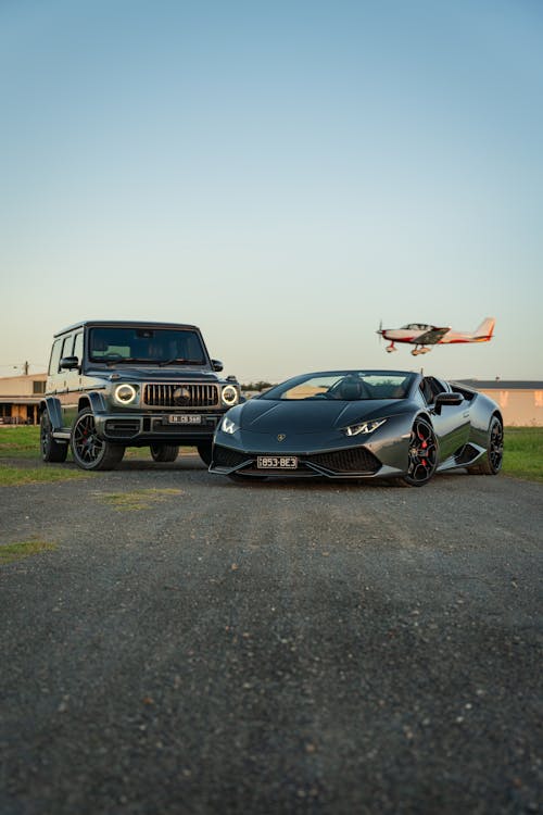 Luxury Black Cars on an Asphalt - Photo Source- PEXELS - Martynas Linge