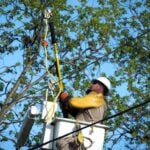 The Entergy worker restoring power lost in storms across Mississippi. Photo Source: Entergy