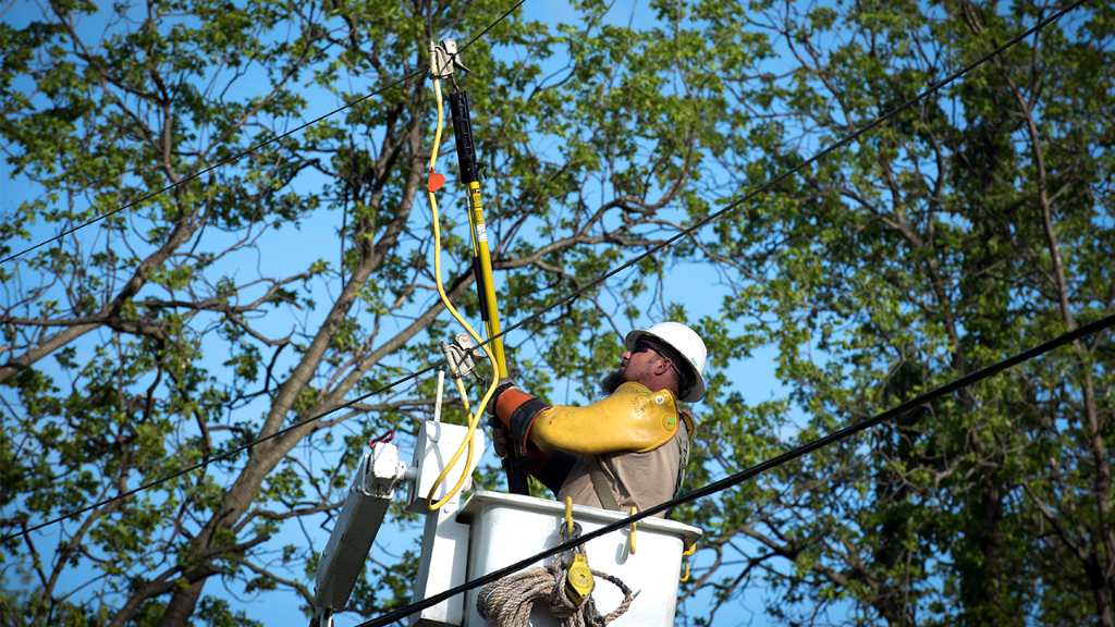 The Entergy worker restoring power lost in storms across Mississippi. Photo Source: Entergy