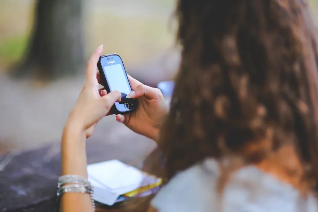 Representative image :- Girl using phone -Photo Credit :- Karolina Grabowska