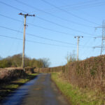 Representative Image. Power Lines. Photo Source: Robin Webster (CC BY-SA 2.0)