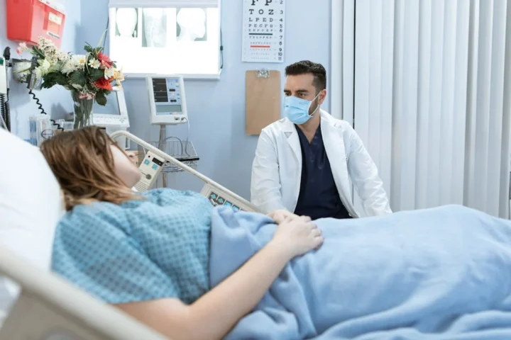Doctor talking to a Patient.