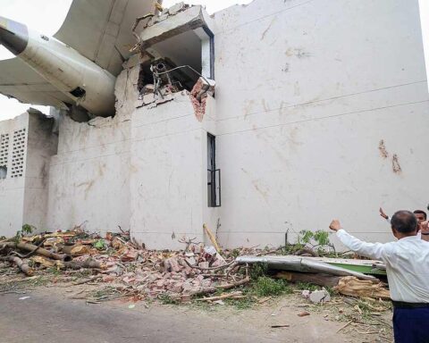 Prime Minister of Bharat, Shri Narendra Damodardas Modi looks on at the wreckage of the crashed Air India Flight 171