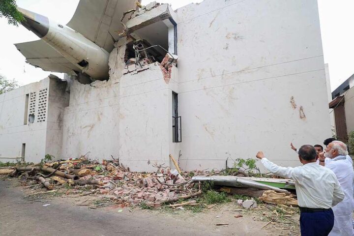 Prime Minister of Bharat, Shri Narendra Damodardas Modi looks on at the wreckage of the crashed Air India Flight 171