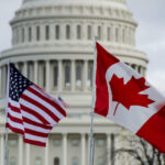 US and Canadian flags at the US Capitol (CC BY-NC-ND 2.0)
