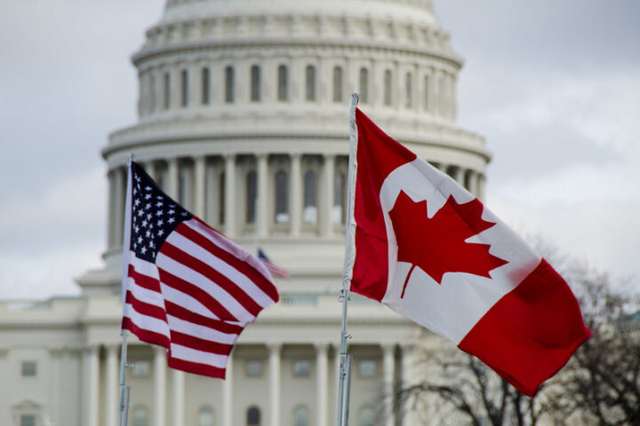 US and Canadian flags at the US Capitol (CC BY-NC-ND 2.0)