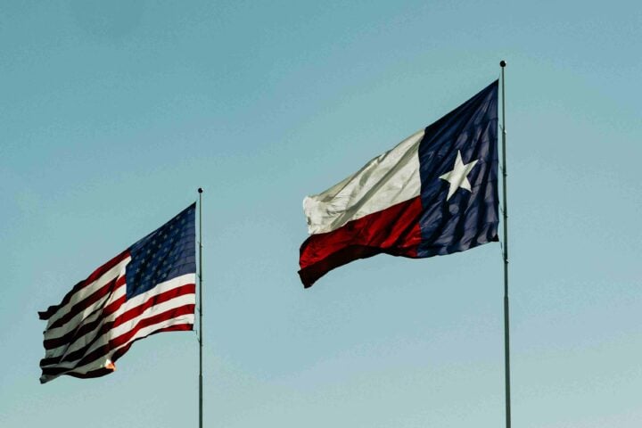 American Flag and Flag of Texas under Blue Sky. Photo Source: Talena Reese (Pexels)