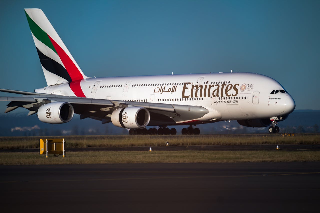 Emirates Airplane Photo Source: Harrison Macourt (Pexels)