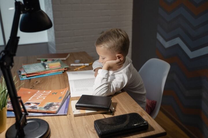 Boy reading a book Photo Source: Tima Miroshnichenko (Pexels)
