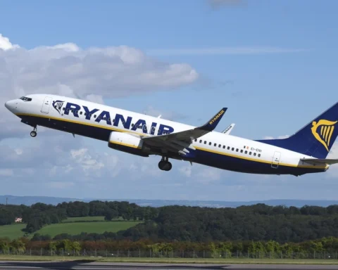 A large passenger jet taking off from an airport runway. Airplane aircraft commercial.