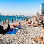 Beach blue sky buildings children Dubai enjoyment fun group Photo Source: PxHere