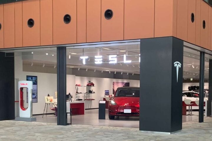 A Nissan Leaf and a Tesla vehicle in the Minatomirai district. Photo Source: Tesla