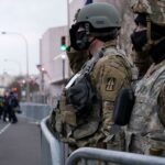 U.S. Soldiers with the Indiana National Guard salute