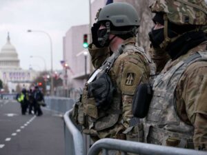 U.S. Soldiers with the Indiana National Guard salute