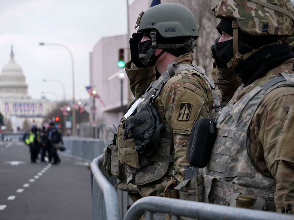 U.S. Soldiers with the Indiana National Guard salute