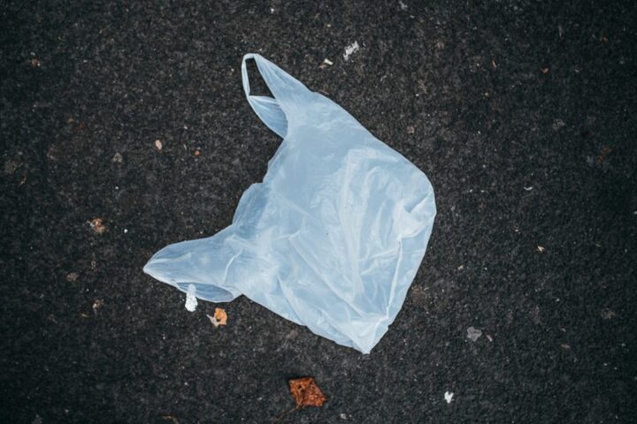 Close-up of a plastic bag thrown on the ground. Plastic waste Photo Source: Ivan Radic (CC BY 2.0)