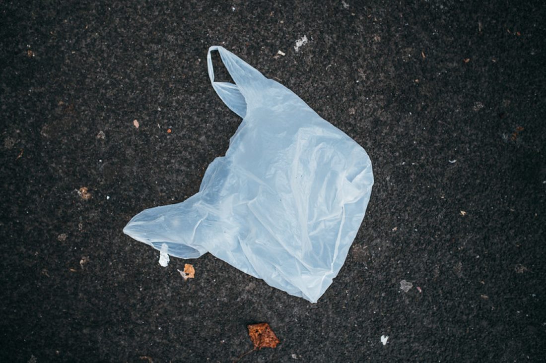 Close-up of a plastic bag thrown on the ground. Plastic waste Photo Source: Ivan Radic (CC BY 2.0)